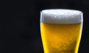 A glass of cold beer macro photography